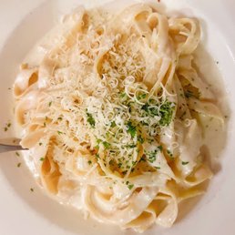 Il Porto signature dishes Lasagna al FornoVeal ParmigianaSpaghetti with White Clam Sauce
